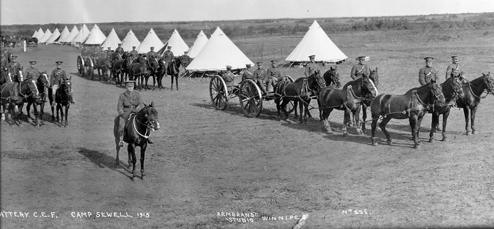 Camp-Sewell-1915 BComd Col Douglas Gunter sits with the Royal family during Queen Elizabeth II's visit to CFB Shilo in 1970.