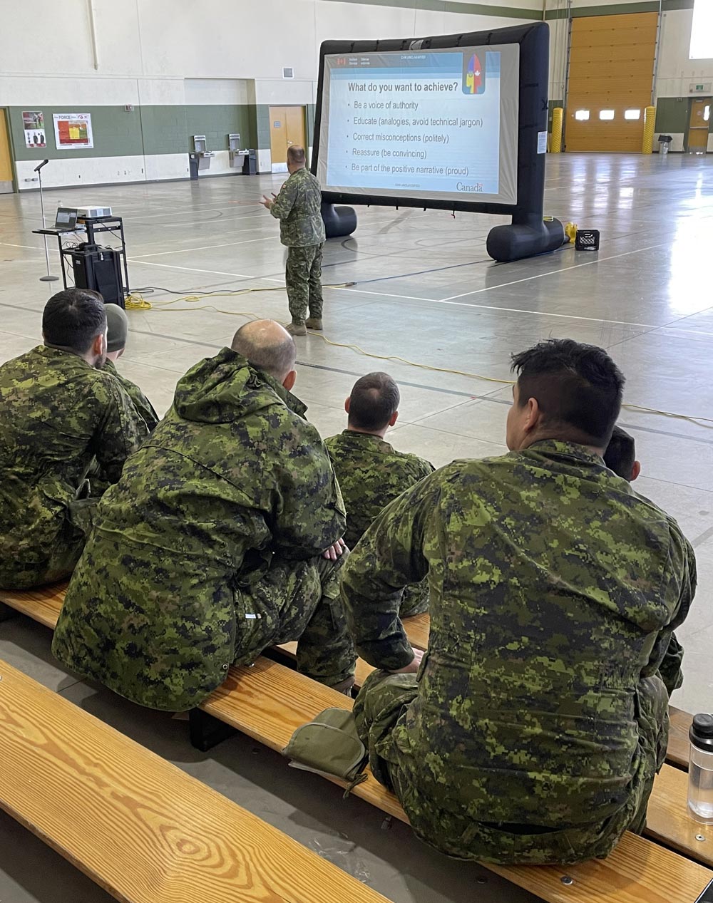 PAO-Op-Unifier-1 BComd Col Douglas Gunter sits with the Royal family during Queen Elizabeth II's visit to CFB Shilo in 1970.