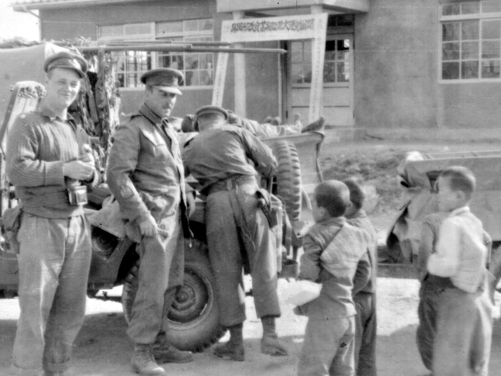 Peacekeeping-1 BComd Col Douglas Gunter sits with the Royal family during Queen Elizabeth II's visit to CFB Shilo in 1970.