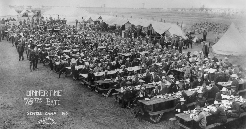Camp-Sewell-1915-dinner BComd Col Douglas Gunter sits with the Royal family during Queen Elizabeth II's visit to CFB Shilo in 1970.