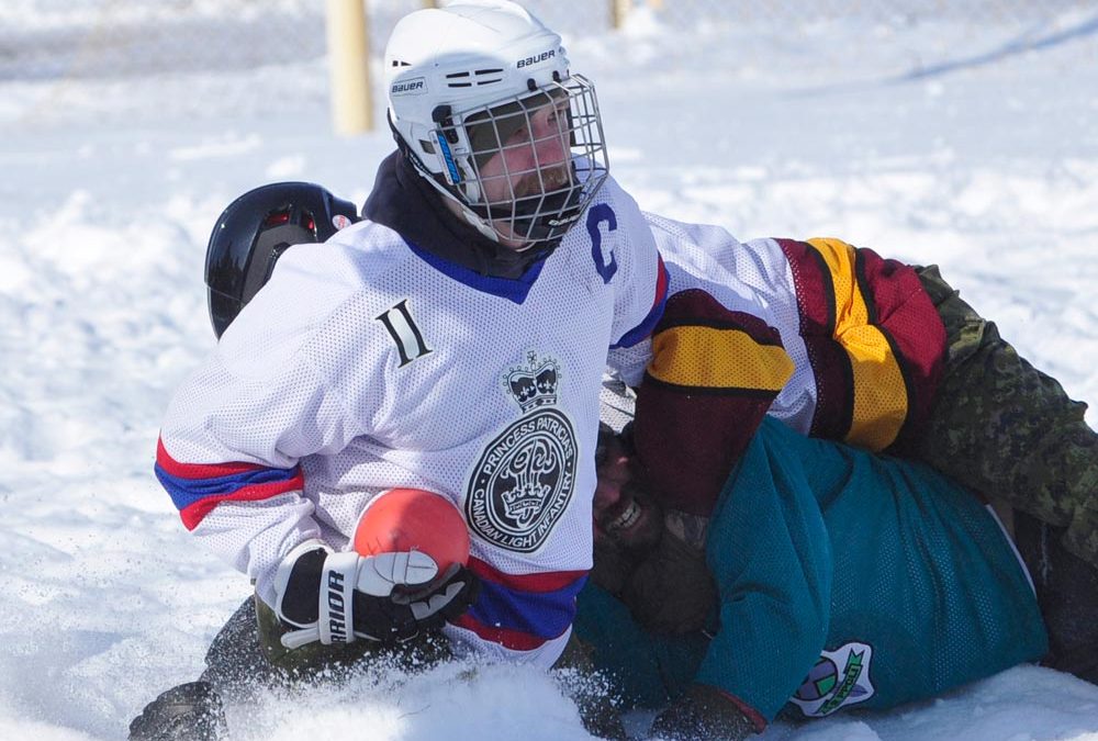 Tradition 2PPCLI host broom-i-loo games on snowy turf