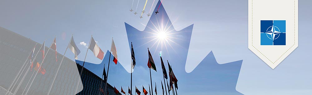 nato-otan-banner MCpl Brandon Liddy