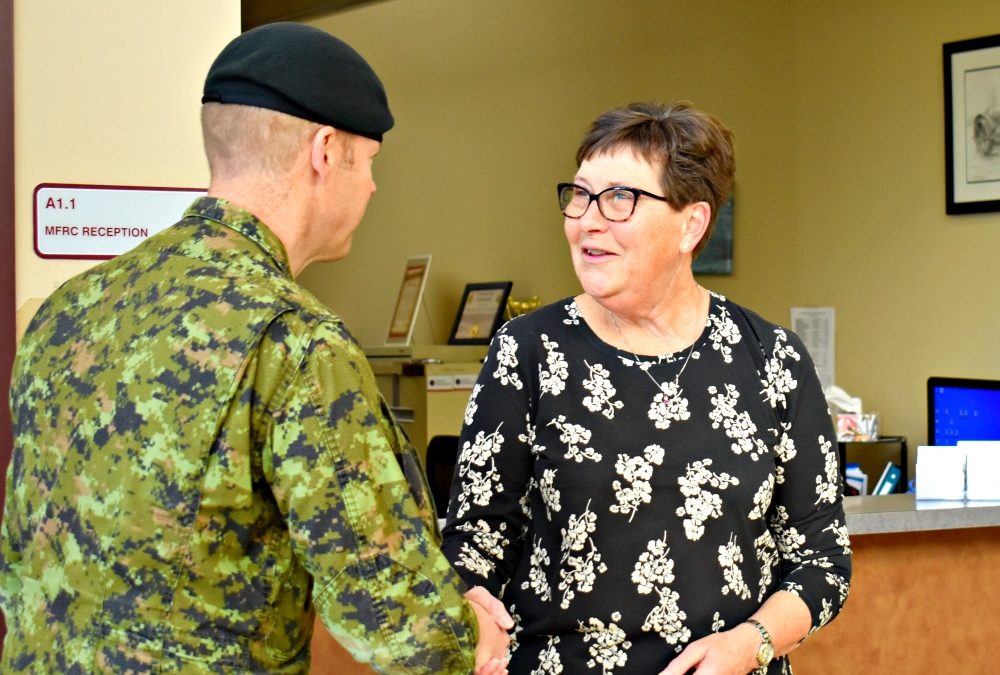 Retiring MFRC Exec. Director receives Commander’s commendation for service to community