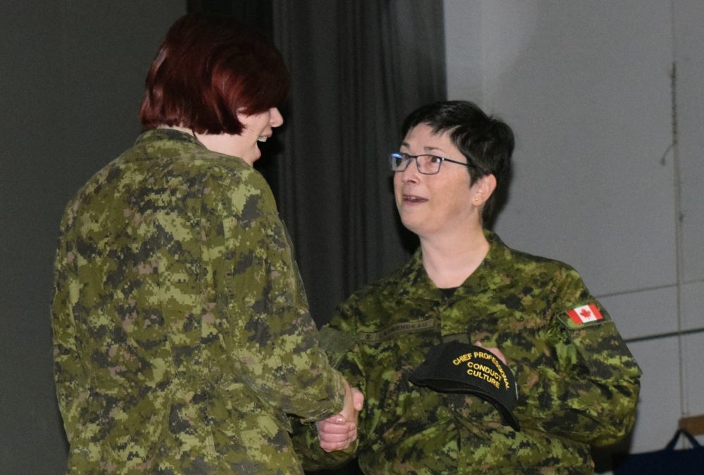 Master Sailor presented award coin at Chief Professional Conduct and Culture visit to CFB Shilo