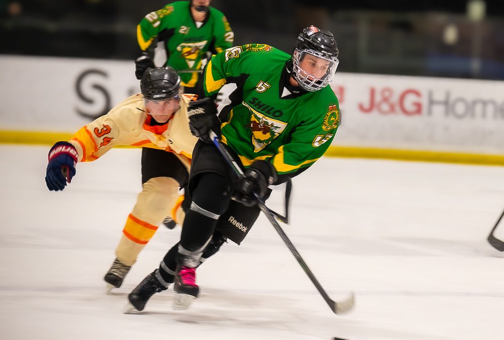 BFES blazes to victory over CFB Shilo in Battle of the Badges hockey