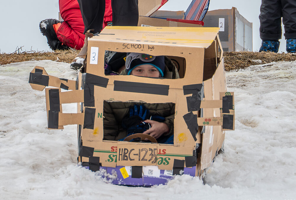Tobogganists torpedeo into champs at CFB Shilo annual cardboard sled races